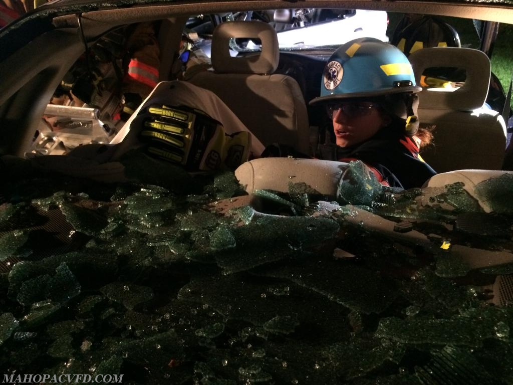 7/19/18 Extrication Training Station 3. EMS company members tending to patients in the vehicle as it is dismantled. 