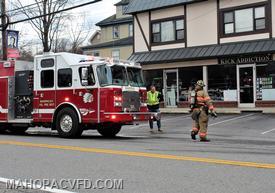 Firefighters head for the building, to begin a search for the source of the call