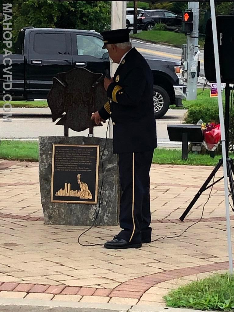 Ex-Chief Frido Goerlich reading the 911 plaque dedicated to all lost that day. 